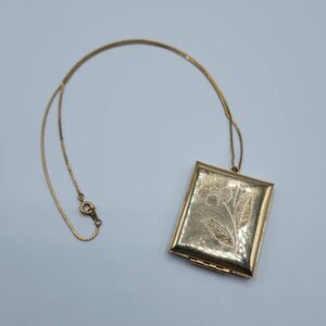 Vintage Gold Tone Etched Flower Spring Ring Locket Necklace